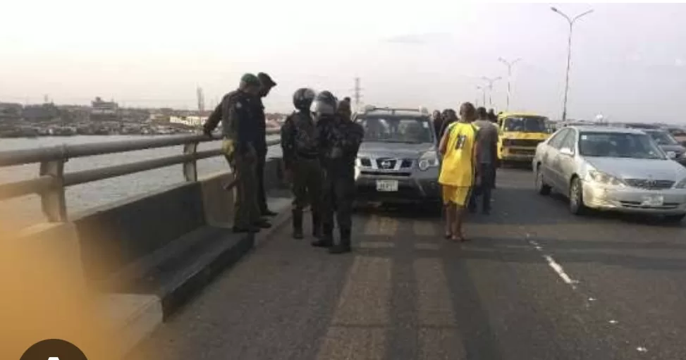 HARDSHIP! Lagos Police Prevent Tragic Suicide Attempt On Third Mainland Bridge