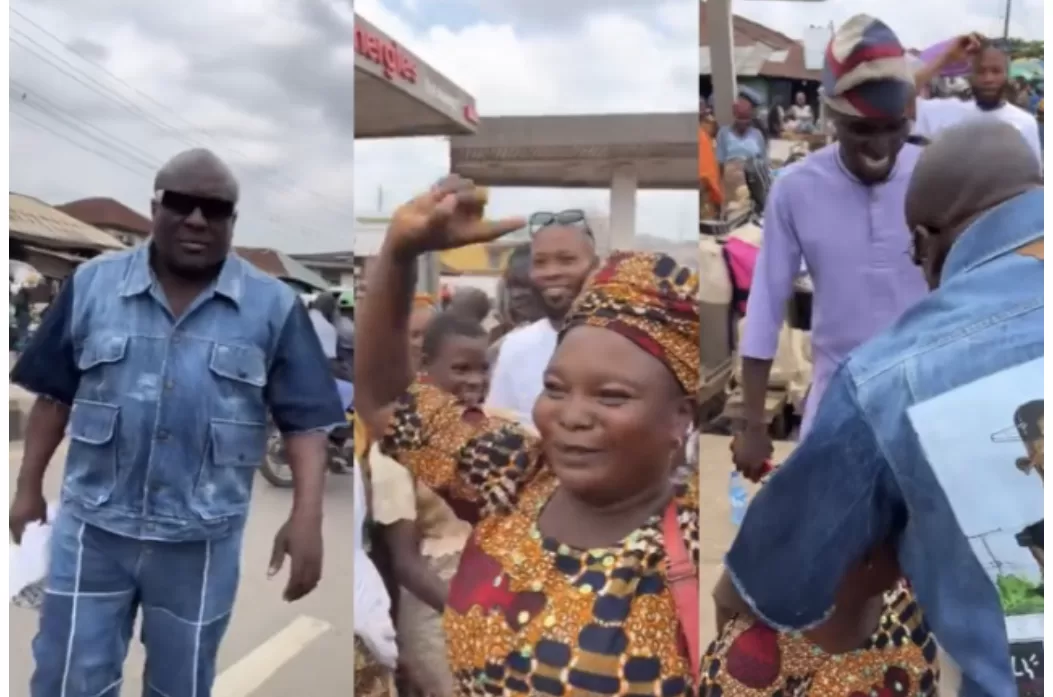 Fuji maestro, Saheed Osupa storms popular market, surprise viral diehard fan, gifts her bundles of money