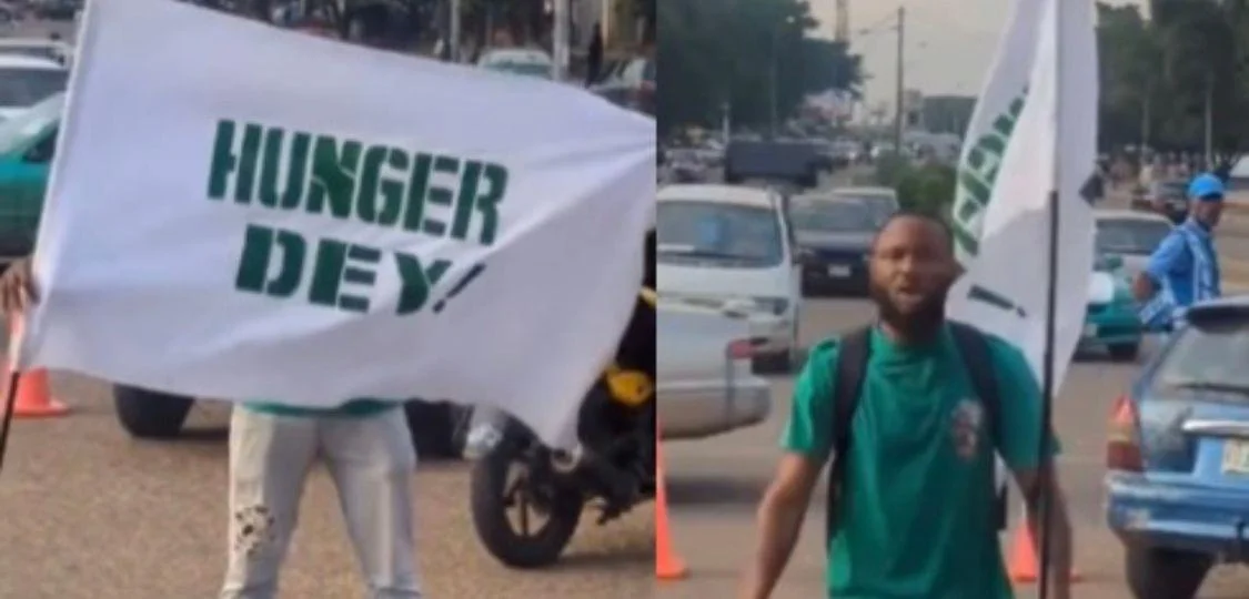 ‘Hungry dey, We must protest!- Nigerian man yells as he protests alone in Abuja (Watch Video)